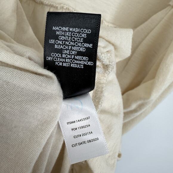 Torrid Cream Ruffle Hem Blouse - Picture 7 of 8